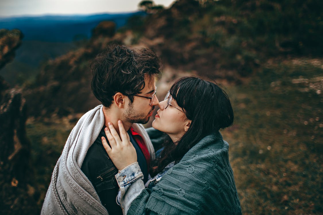 Man and Woman About to Kiss