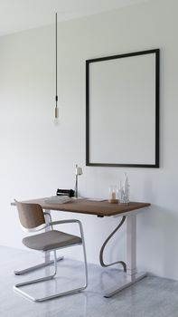 Sleek modern desk setting with empty frame for artwork.