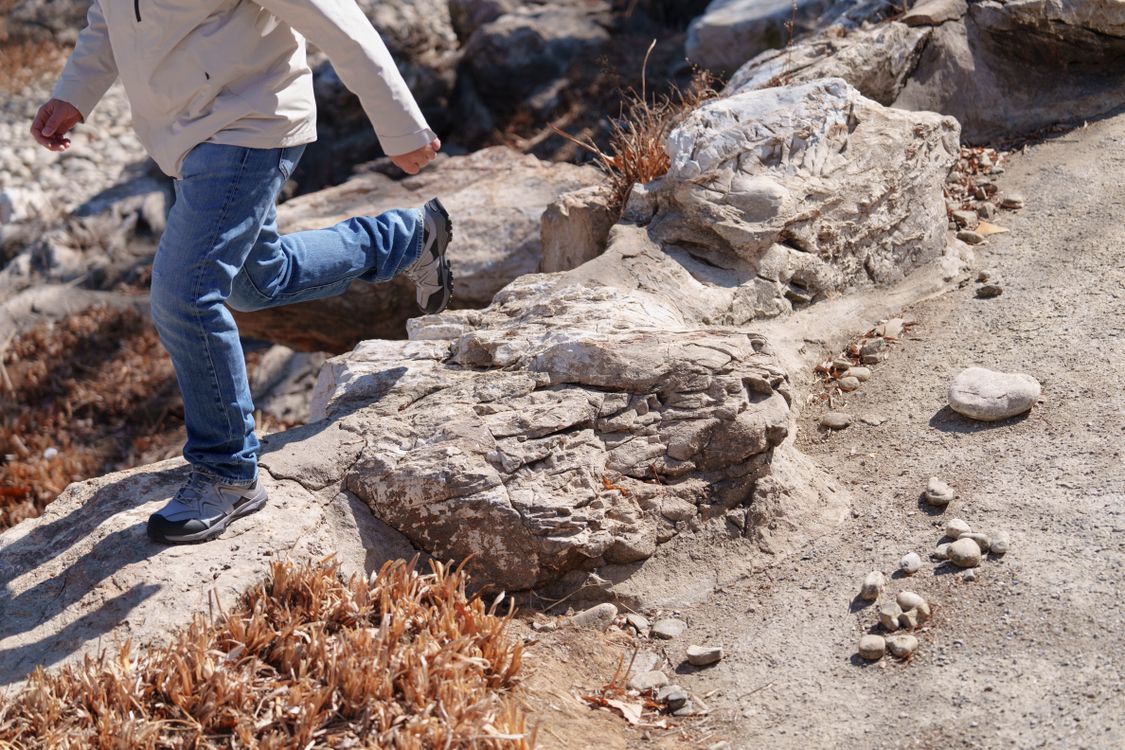 Man Walking on a Rocks by the Desert · Free Stock Photo