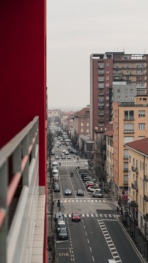 A view of a city street from a balcony