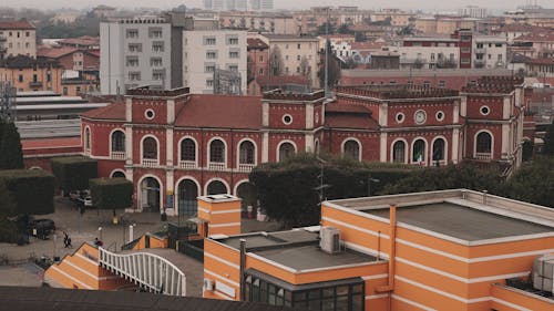 A view of a city with a large building in the background