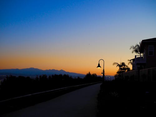 Free stock photo of california sunrise, lamp posts at sunrise, long beach Stock Photo