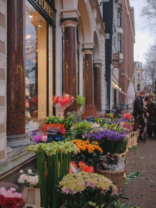 A street with flowers and other items on it