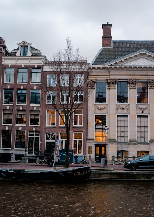 A boat is parked in front of a building