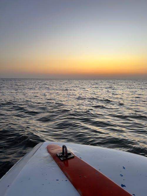 ビーチ, ビーチの夕日, ボートの無料の写真素材