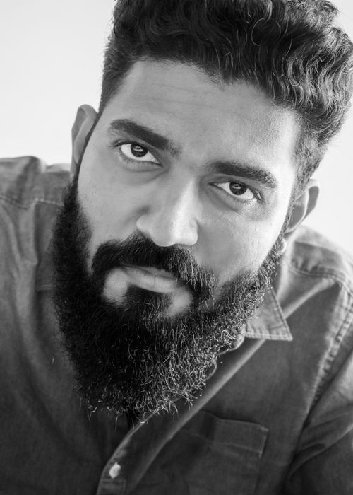 Free Striking black and white close-up portrait of a thoughtful bearded man. Stock Photo