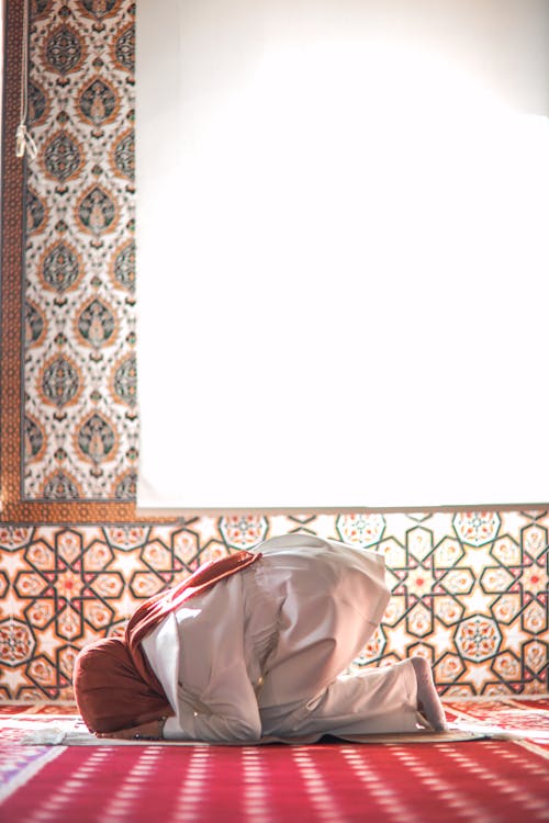 Woman Praying at Mosque