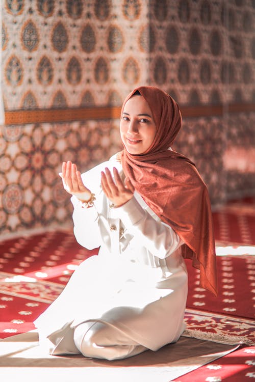 Smiling Woman Praying at Mosque