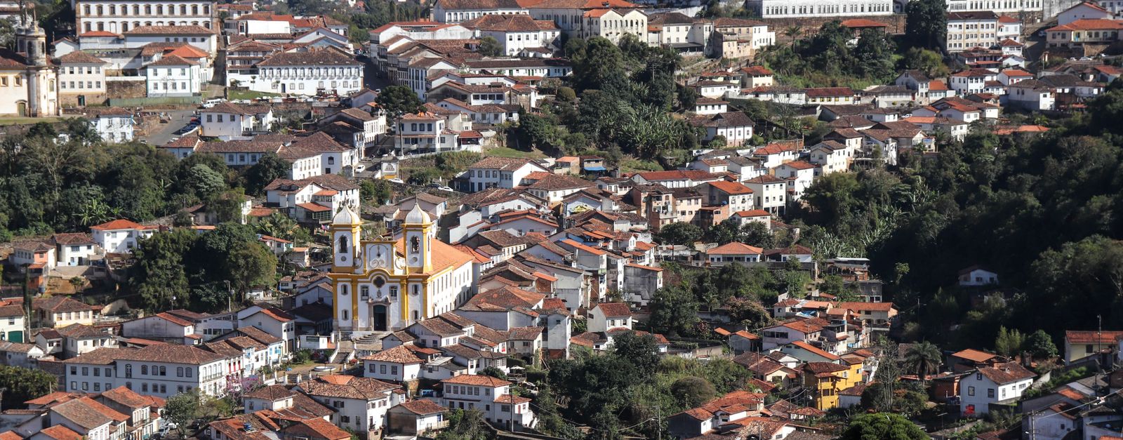 Aerial view showcasing the historic town of Ouro Preto, Brazil with colonial architecture.