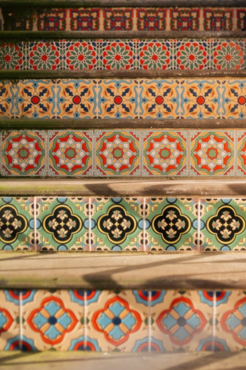 A set of stairs with colorful tiles on them