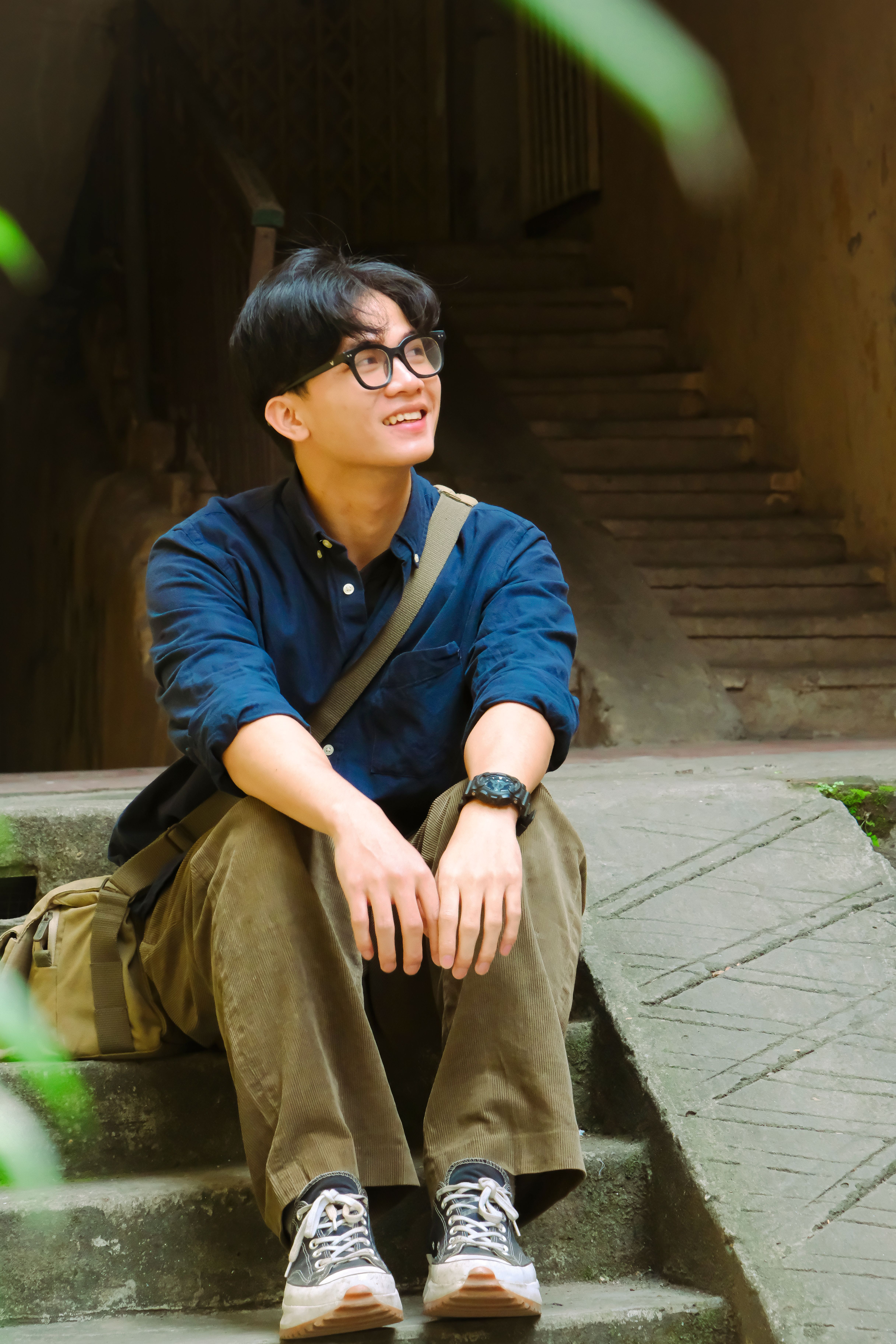 Portrait of a Man Sitting Outdoors · Free Stock Photo