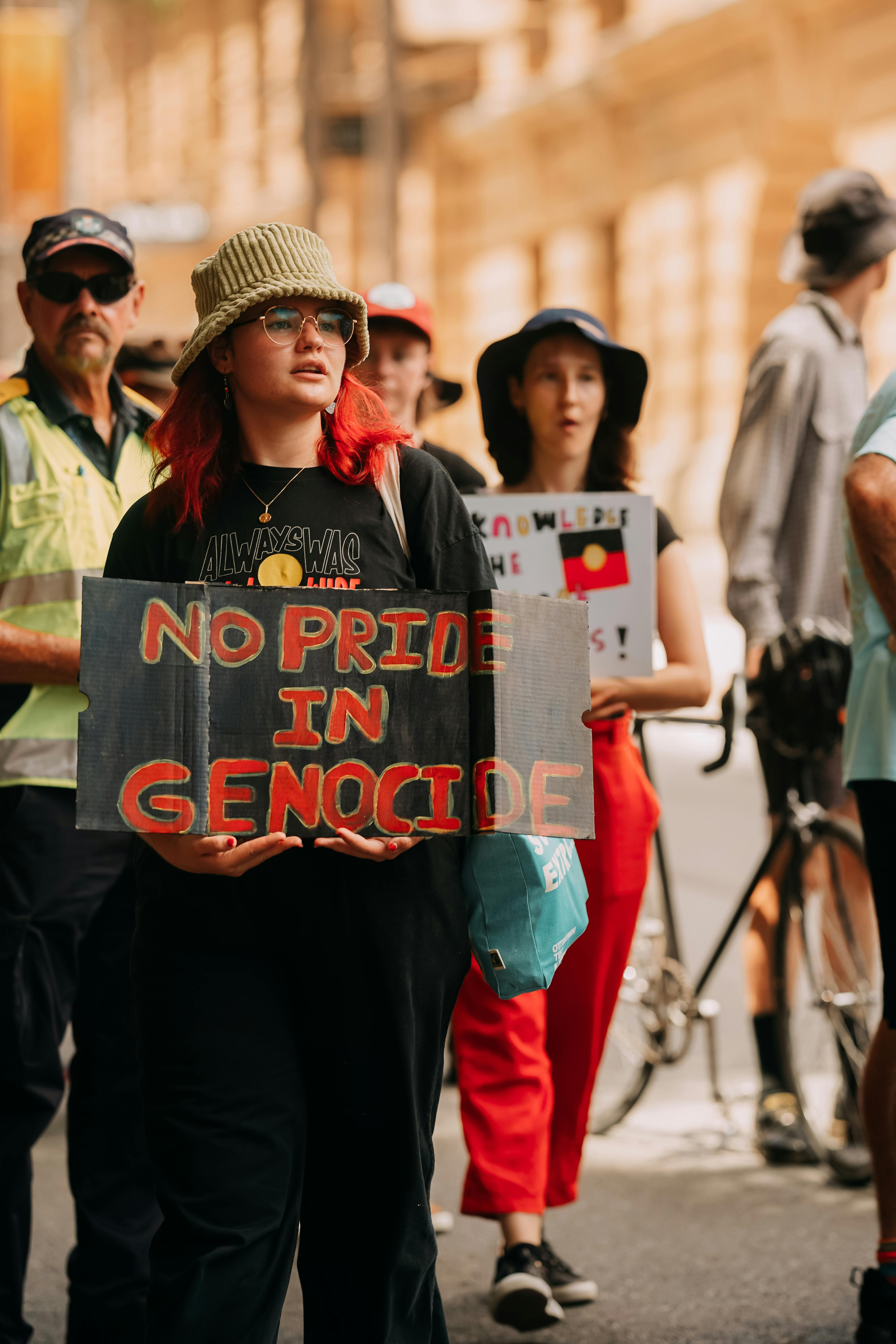 Protesters Holding Posters during their Rally · Free Stock Photo