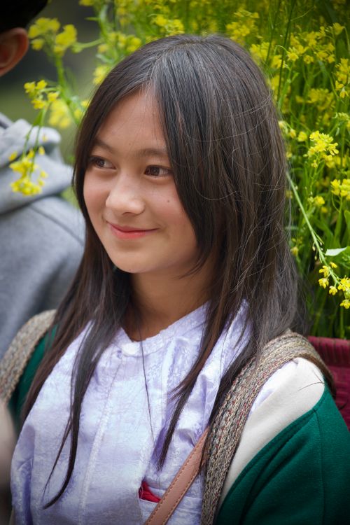 Portrait of Smiling Girl with Long, Black Hair · Free Stock Photo