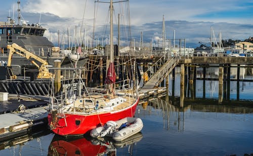 Free A boat docked at a dock with a dock Stock Photo