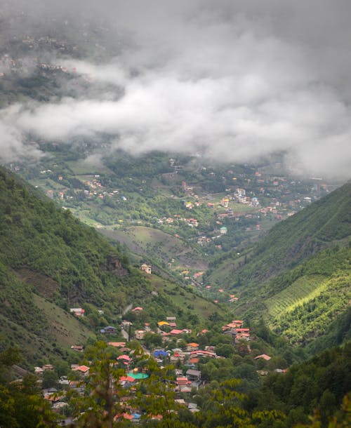 Foto profissional grátis de aldeia, aldeias, colinas