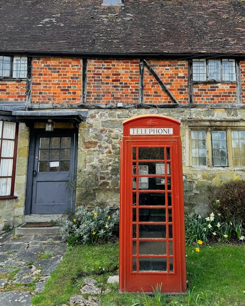 red phone box and country cottage