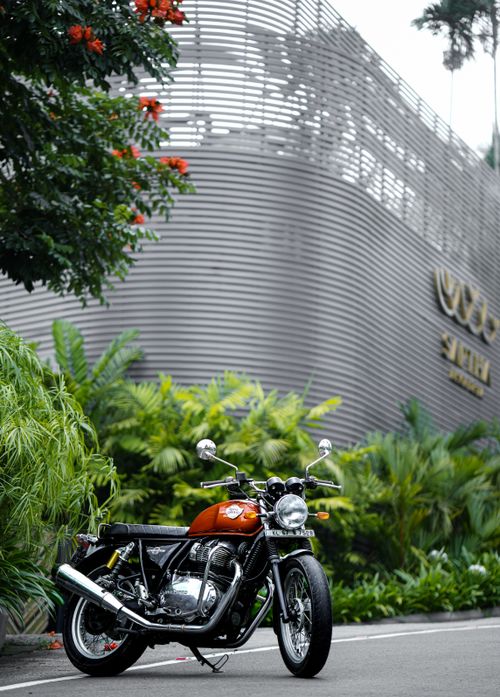 Free Royal Enfield Interceptor 650 motorcycle parked on a city street in Sultan Bathery, India. Stock Photo