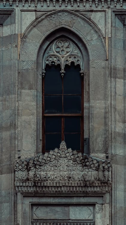 A window with ornate designs on it