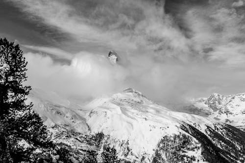 Mountain Peak Covered with Clouds