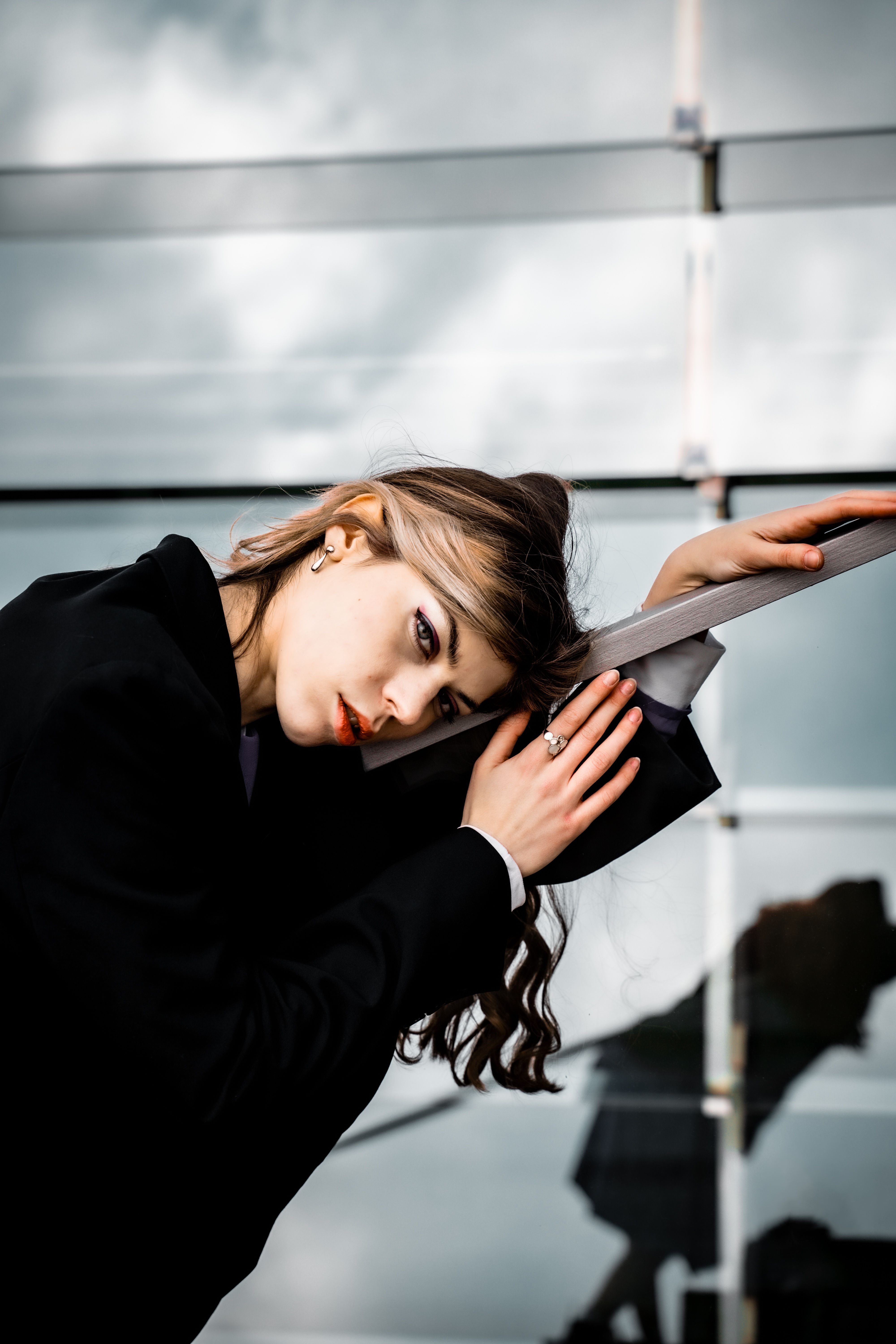 Blonde Woman Leaning on Handrail · Free Stock Photo