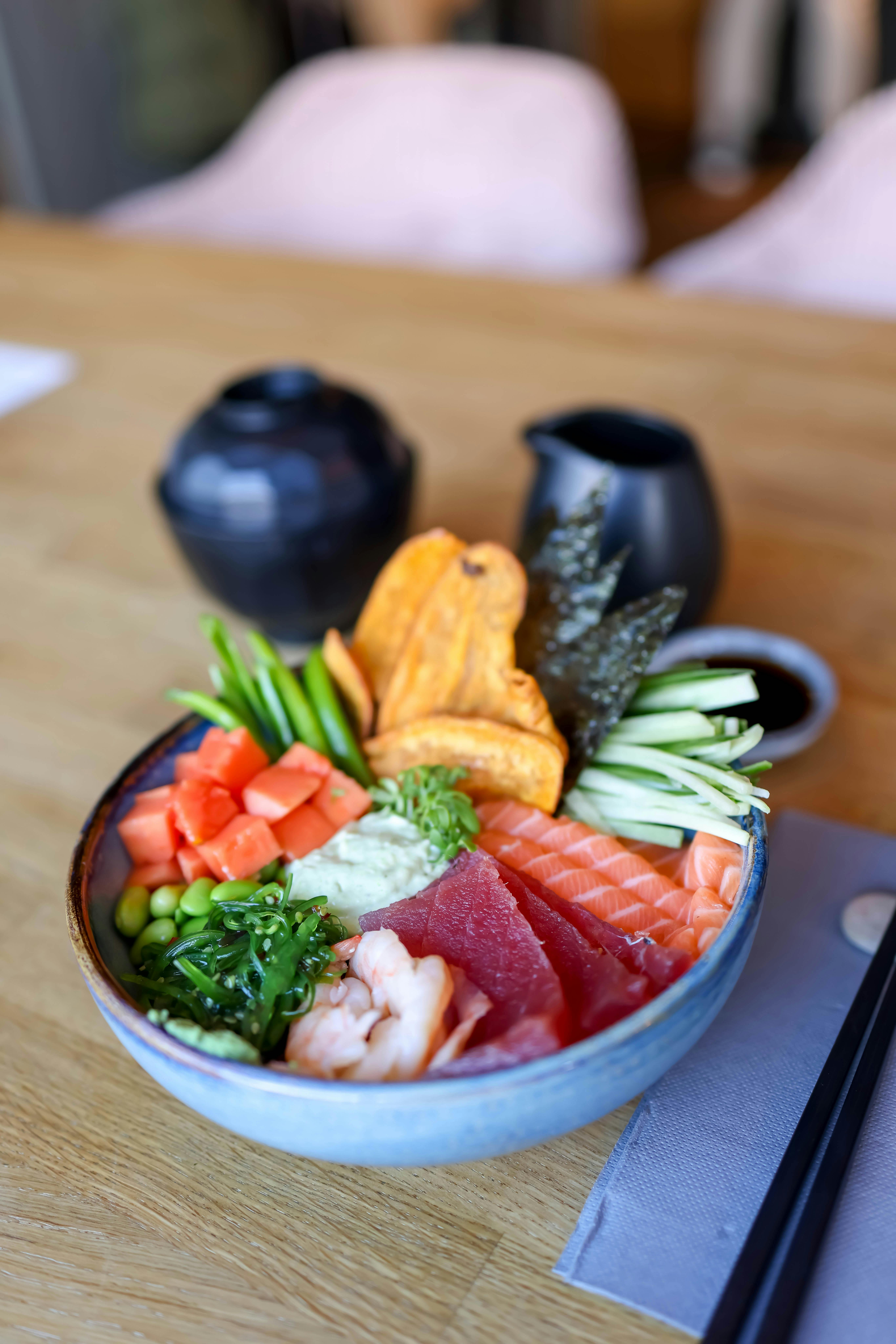 A table setting with a beautifully plated, healthy meal, showcasing a variety of colorful vegetables and lean protein.