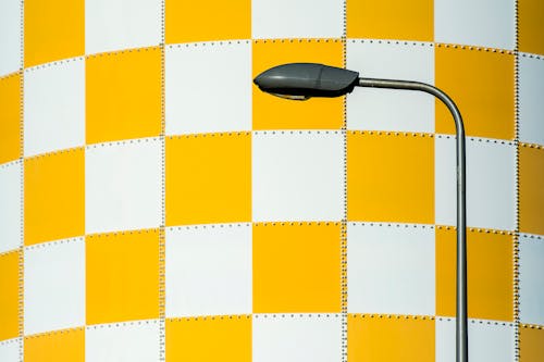 Lamp against White and Yellow Checked Wall