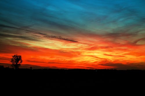 Základová fotografie zdarma na téma červený západ slunce, nádherný západ slunce, obloha