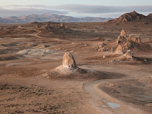 çöl, dolambaçlı yol, kum içeren Ücretsiz stok fotoğraf