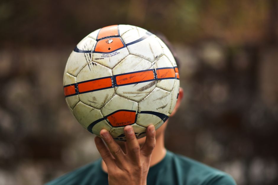 half|hand catching a ball