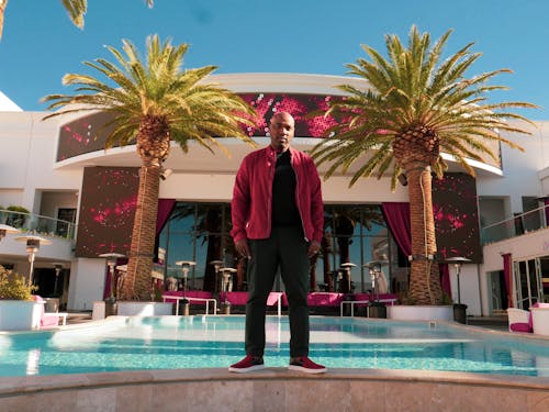 Man Standing on Pool