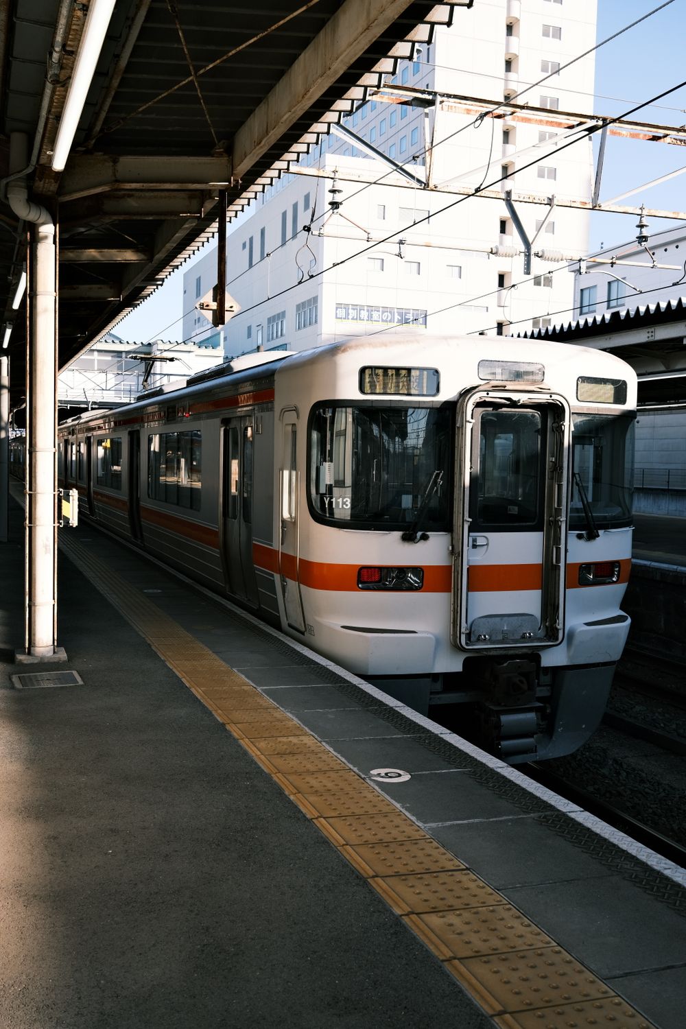View of a Train at the Station in a Japanese City · Free Stock Photo