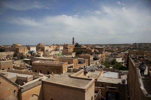 Free Stunning aerial view of Midyat, Mardin showcasing traditional architecture and vibrant history. Stock Photo