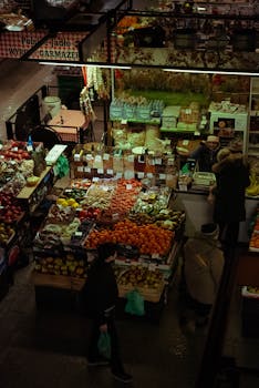 A bustling market scene with fresh produce and shoppers in Wrocław, Poland.