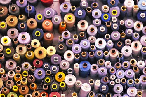 Close-up of Colorful Thread Spools 