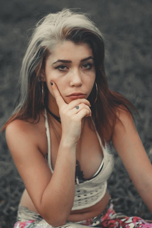 Woman Wearing White Spaghetti Strap Top