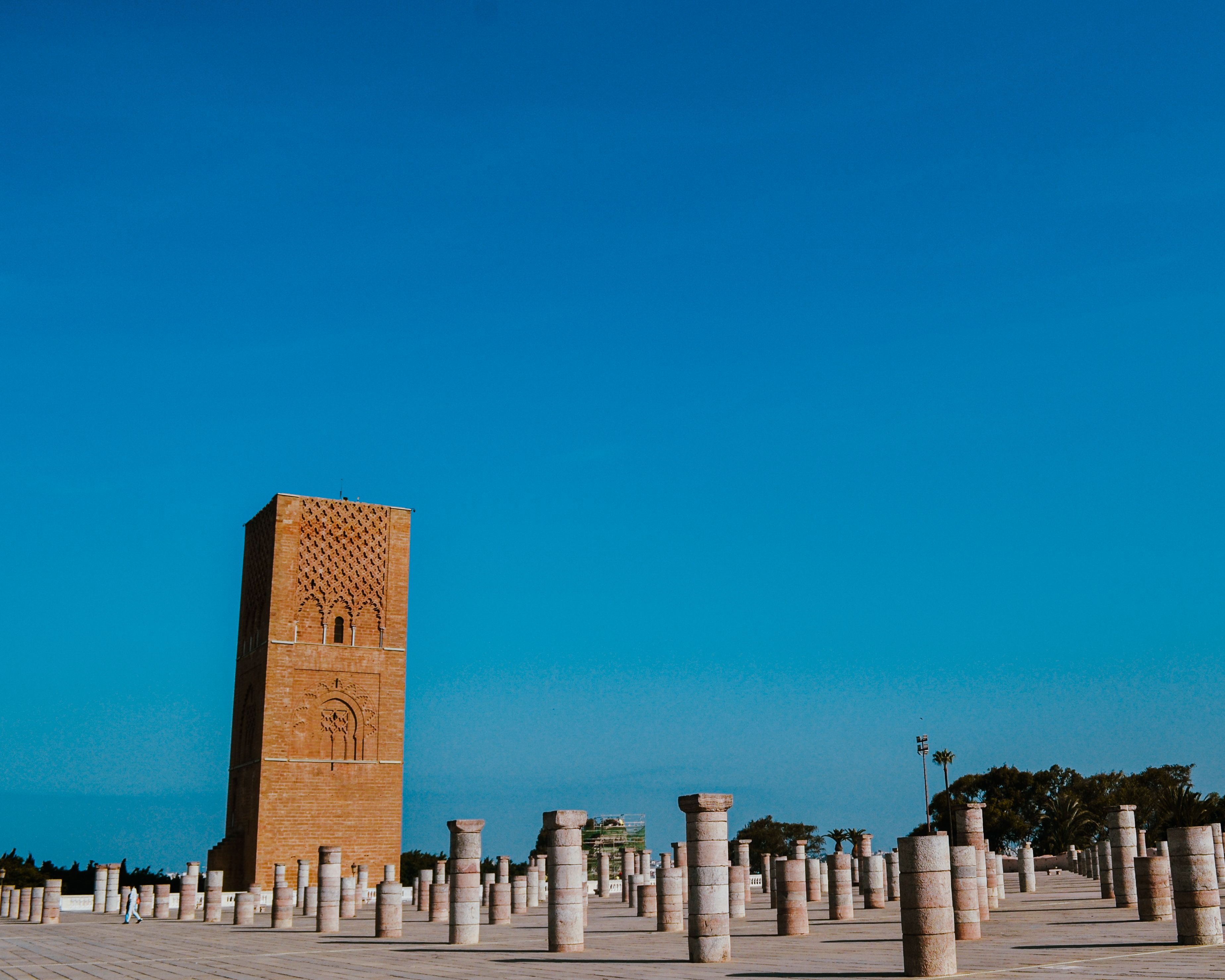 Explore the historical Hassan Tower and columns in Rabat, Morocco on a clear day.