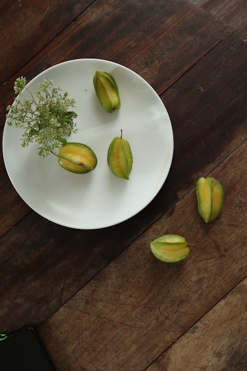 Foto profissional grátis de carambola, de madeira, inclinar