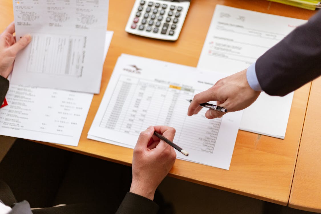 Free Person Resting Their Hand on Table Stock Photo