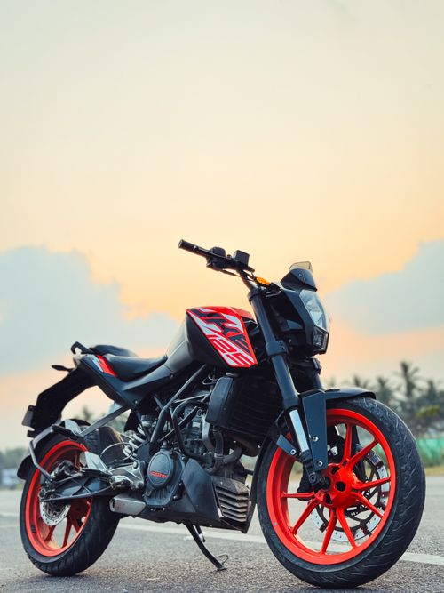 Free A powerful motorcycle captured at sunset on a road in Amalapuram, India. Stock Photo