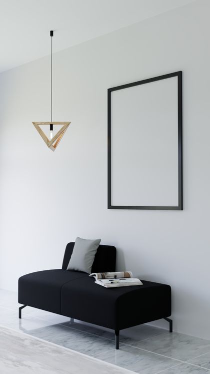 Contemporary living room with a black couch by Paul Seling on Pexels