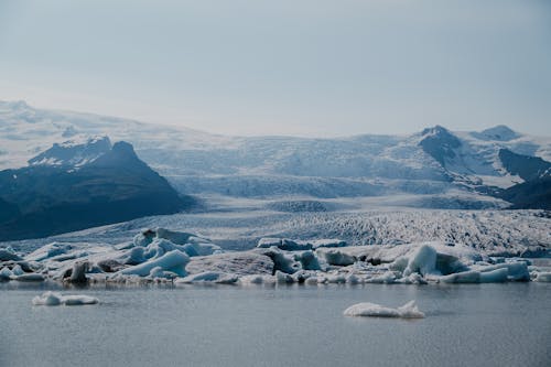 A view of a glacier and icebergs in iceland