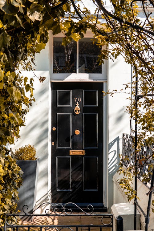 Photo of Closed Black Wooden Door