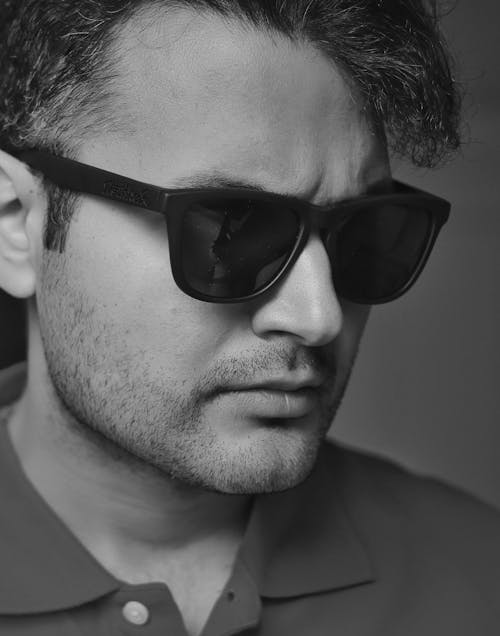 Black and White Portrait of a Young Man in Sunglasses 