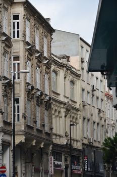 View of historic European style buildings in a city setting with urban charm and vertical perspective.
