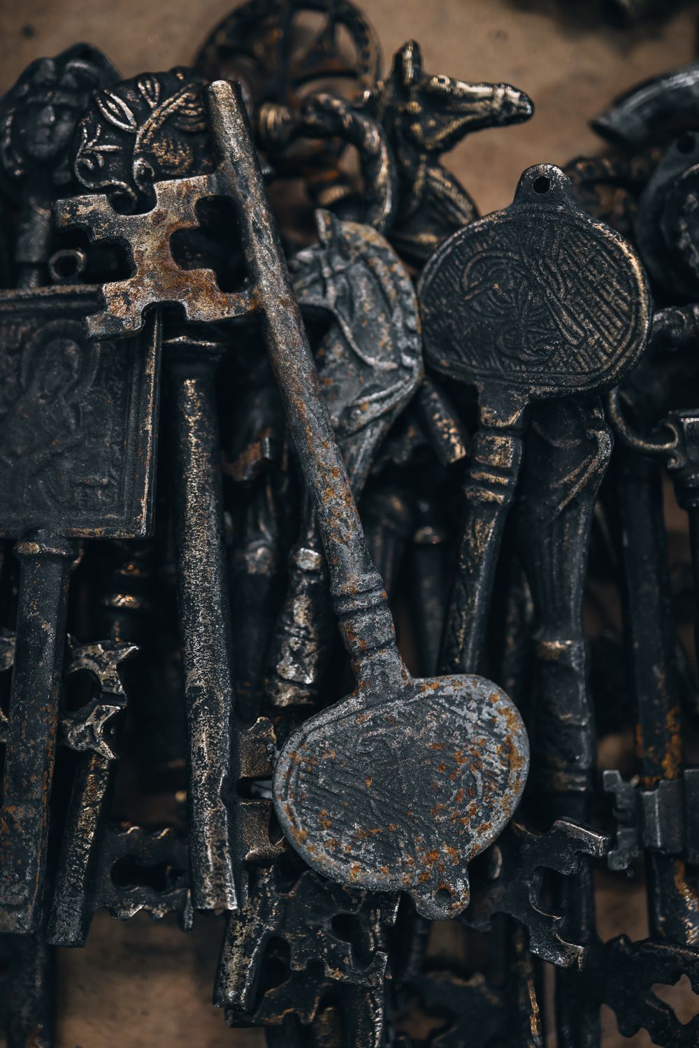 A pile of antique metal keys