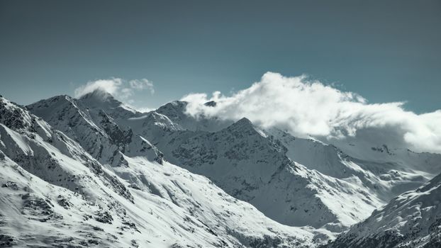 A breathtaking view of snow-covered mountains in Sölden, Tirol, Austria.