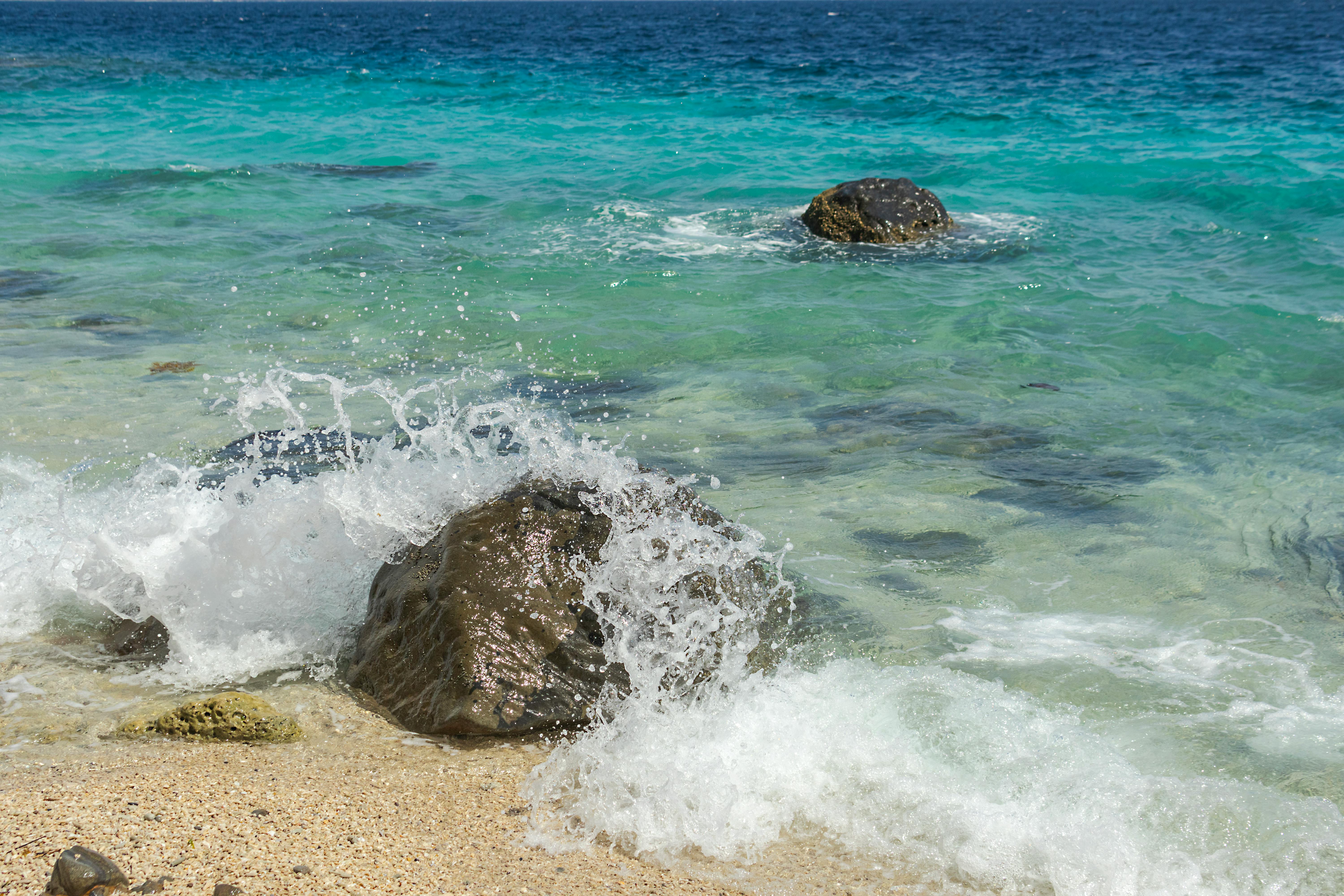 waves crashing on rock