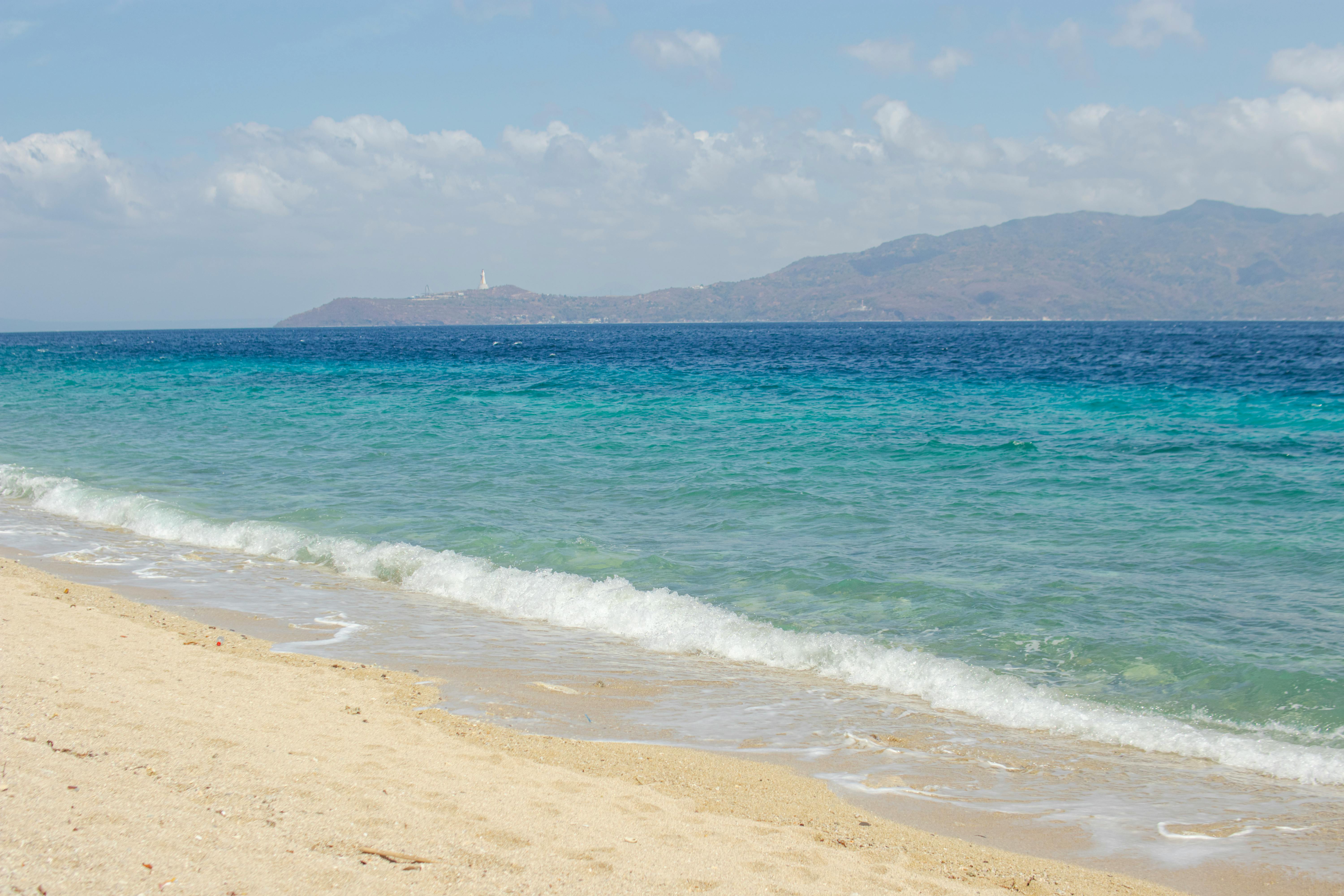 Coral reef and boats at Atauro Island