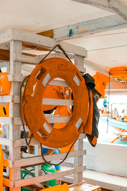 A life preserver hanging on a wall in a boat