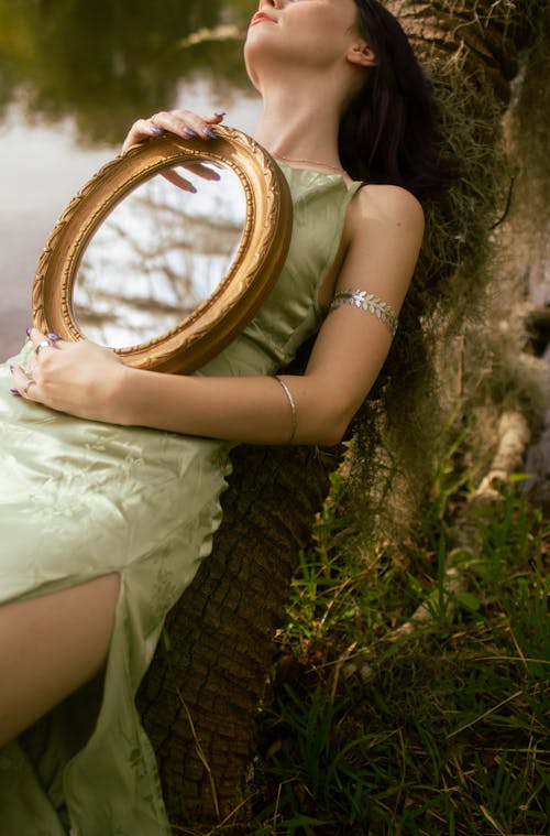 Woman with Mirror on Tree